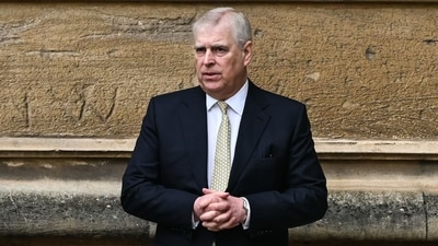 A former UK security minister said Friday, december 13, that it was "extremely embarrassing" that a suspected Chinese spy had become a confidant of disgraced royal Prince Andrew. (Photo by JUSTIN TALLIS / AFP) (AFP)
