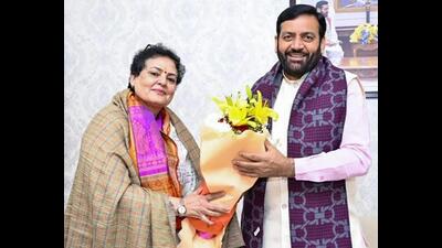 Haryana chief minister Nayab Singh Saini congratulating Rekha Sharma on her unopposed election to the Rajya Sabha on Friday. (Nayab Saini/X)