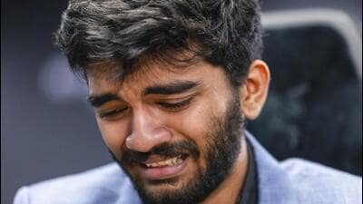 India's D Gukesh reacts after beating title-holder China’s Ding Liren to win world chess championship title. (PTI)