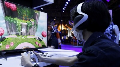 An attendee plays the Astro Bot video game on a Sony Group Corp. PlayStation 5 (PS5) video game console at the Tokyo Game Show in Chiba, Japan (Bloomberg) An attendee plays the Astro Bot video game on a Sony Group Corp. PlayStation 5 (PS5) video game console at the Tokyo Game Show in Chiba, Japan (Bloomberg)