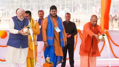 Prime Minister Narendra Modi with Uttar Pradesh Chief Minister Yogi Adityanath performs worship at the Sangam Nose, in Prayagraj, Friday, Dec. 13, 2024. (PTI) Prime Minister Narendra Modi with Uttar Pradesh Chief Minister Yogi Adityanath performs worship at the Sangam Nose, in Prayagraj, Friday, Dec. 13, 2024. (PTI)