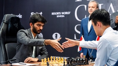 India's D Gukesh, left, and China's Ding Liren during the FIDE World Chess Championship 2024, in Singapore (PTI) India's D Gukesh, left, and China's Ding Liren during the FIDE World Chess Championship 2024, in Singapore (PTI)