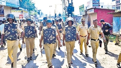 Parbhani: Security personnel patrol after violent protests took place for the second day over alleged vandalising of a replica of the Indian Constitution, in Parbhani, Maharashtra, Wednesday, Dec. 11, 2024. (PTI Photo) (PTI12_11_2024_000226B) (PTI) Parbhani: Security personnel patrol after violent protests took place for the second day over alleged vandalising of a replica of the Indian Constitution, in Parbhani, Maharashtra, Wednesday, Dec. 11, 2024. (PTI Photo) (PTI12_11_2024_000226B) (PTI)
