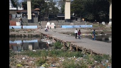 The 50-metre-long and 4.7-metre-wide Vriddheshwar-Siddheshwar causeway has become more of a local utility than serving as a transportation route for vehicles/pedestrians. (MAHENDRA KOHLE/ HT PHOTO) The 50-metre-long and 4.7-metre-wide Vriddheshwar-Siddheshwar causeway has become more of a local utility than serving as a transportation route for vehicles/pedestrians. (MAHENDRA KOHLE/ HT PHOTO)