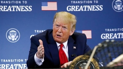 FILE - President Donald Trump attends a roundtable discussion with commercial fishermen at Bangor International Airport in Bangor, Maine, June 5, 2020. (AP Photo/Patrick Semansky, File) (AP) FILE - President Donald Trump attends a roundtable discussion with commercial fishermen at Bangor International Airport in Bangor, Maine, June 5, 2020. (AP Photo/Patrick Semansky, File) (AP)