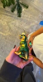 Kylie Jenner's tree features a cute dinosaur clip-on. Kylie Jenner's tree features a cute dinosaur clip-on.