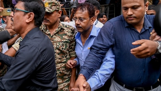 CBI officials produce the former principal of RG Kar Medical College and Hospital Sandip Ghosh, arrested in connection with the alleged financial misconduct at the establishment. (PTI)