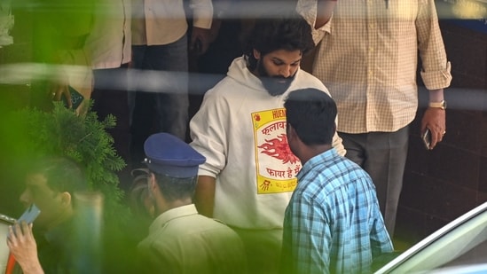 Indian actor Allu Arjun (C) comes out of the Chikkadpally police station following his arrest by the police in Hyderabad on December 13. Indian actor Allu Arjun (C) comes out of the Chikkadpally police station following his arrest by the police in Hyderabad on December 13.