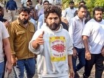 Allu Arjun arrives to speak with the media at his residence after he was released from the jail, in Hyderabad, Saturday. (PTI Photo) Allu Arjun arrives to speak with the media at his residence after he was released from the jail, in Hyderabad, Saturday. (PTI Photo)