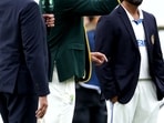 Rohit Sharma and Pat Cummins involved in the toss at the Gabba in Brisbane for the third Test match. Rohit Sharma and Pat Cummins involved in the toss at the Gabba in Brisbane for the third Test match.