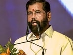 Shiv Sena leader Eknath Shinde takes oath as Maharashtra Deputy Chief Minister during the swearing-in ceremony, in Mumbai,