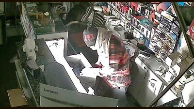 A video grab of the accused at the mobile shop on Kalgidhar Road, metres away from the Division Number 2 police station, in Ludhiana. (HT Photo) A video grab of the accused at the mobile shop on Kalgidhar Road, metres away from the Division Number 2 police station, in Ludhiana. (HT Photo)