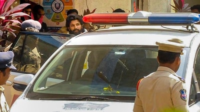 Allu Arjun leaves the Chikkadpally Police Station, in Hyderabad, Friday, Dec. 13, after his arrest. (PTI Photo) (PTI) Allu Arjun leaves the Chikkadpally Police Station, in Hyderabad, Friday, Dec. 13, after his arrest. (PTI Photo) (PTI)