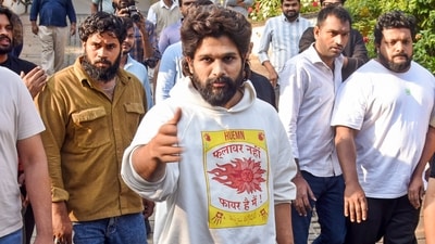 Allu Arjun arrives to speak with the media at his residence after he was released from the jail, in Hyderabad, Saturday. (PTI Photo) (PTI) Allu Arjun arrives to speak with the media at his residence after he was released from the jail, in Hyderabad, Saturday. (PTI Photo) (PTI)