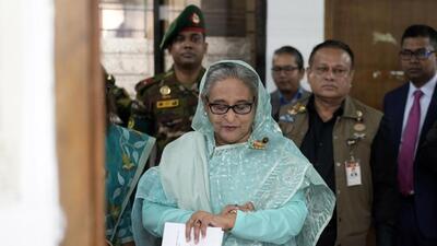Bangladesh Prime Minister Sheikh Hasina checks her watch as she waits for the official opening time to cast her vote in Dhaka, Bangladesh, January 7 (AP) Bangladesh Prime Minister Sheikh Hasina checks her watch as she waits for the official opening time to cast her vote in Dhaka, Bangladesh, January 7 (AP)