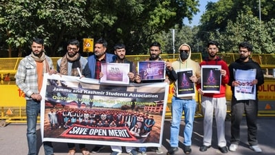 Jammu and Kashmir Students Association (JKSA) supporters holding placards protest urging the government to revise the new reservation policy, at Jantar Mantar in New Delhi on Saturday. (ANI) Jammu and Kashmir Students Association (JKSA) supporters holding placards protest urging the government to revise the new reservation policy, at Jantar Mantar in New Delhi on Saturday. (ANI)