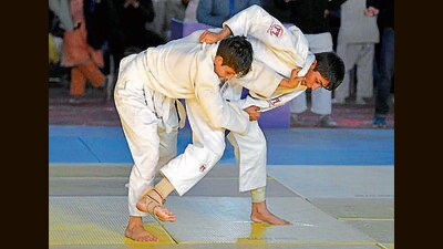 Judo players in action during a match at Multipurpose Hall in Ludhiana on Saturday. (HT Photo)