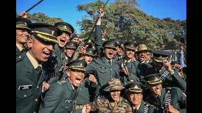 Newly commissioned officers celebrate after their passing-out parade at the Indian Military Academy (IMA) in Dehradun on Saturday. (AFP)