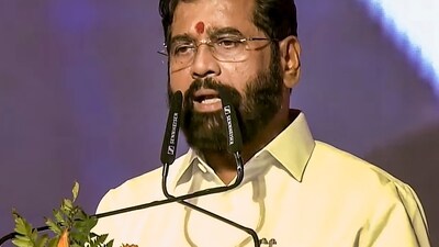 Shiv Sena leader Eknath Shinde takes oath as Maharashtra Deputy Chief Minister during the swearing-in ceremony, in Mumbai, (PTI)
