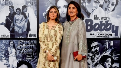 Veteran Bollywood actor Neetu Kapoor, right, with daughter Riddhima Kapoor during the birth centenary celebration event of late legendary actor and filmmaker Raj Kapoor, in Mumbai. They both chose classic kurta outfits in silver and beige, respectively. Neetu wore a Misha Lakhani creation. (PTI)