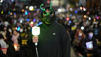 Young students participated in the rally, carrying bright k-pop lights and wearing costumes and accessories. (AP Photo/Lee Jin-man) Young students participated in the rally, carrying bright k-pop lights and wearing costumes and accessories. (AP Photo/Lee Jin-man)