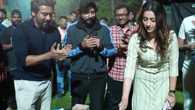 Suriya and RJ Balaji celebrated Trisha Krishnan completing 22 years of her career on the sets of their film.