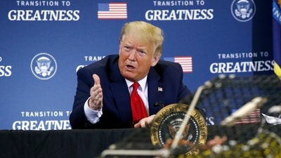 FILE - President Donald Trump attends a roundtable discussion with commercial fishermen at Bangor International Airport in Bangor, Maine, June 5, 2020. (AP Photo/Patrick Semansky, File) (AP) FILE - President Donald Trump attends a roundtable discussion with commercial fishermen at Bangor International Airport in Bangor, Maine, June 5, 2020. (AP Photo/Patrick Semansky, File) (AP)