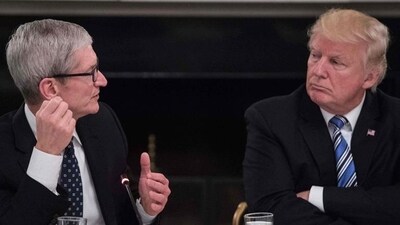 Donald Trump hosted Apple CEO Tim Cook for a Friday evening meal at the president-elect's Mar-a-Lago resort (AFP ) Donald Trump hosted Apple CEO Tim Cook for a Friday evening meal at the president-elect's Mar-a-Lago resort (AFP )