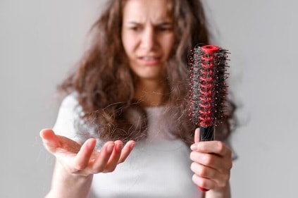 Environmental factors are also at play when it comes to hair fall as the pollutants can lead to hair dryness, flakiness of scalp, weakening of hair follicles among other issues. (Freepik) Environmental factors are also at play when it comes to hair fall as the pollutants can lead to hair dryness, flakiness of scalp, weakening of hair follicles among other issues. (Freepik)