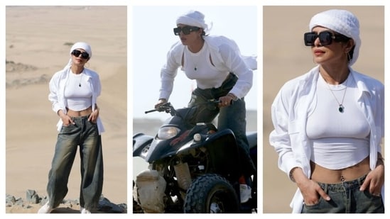 For her desert adventure, she rode dune buggy. Rocking her chic style, she looked relaxed in a wide-legged pants, crop white top and shirt. It's ideal for a day out in the sun.&nbsp;(Instagram)