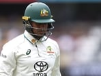 Australia's Usman Khawaja walks off after his dismissal on day two. Australia's Usman Khawaja walks off after his dismissal on day two.