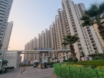 The dispute centres on the Sports City group housing scheme, which required realtors to develop world-class sports infrastructure on 70% of the allotted land. Instead, developers prioritised residential projects, leading the Noida authority to ban registries, map approvals, and occupancy certificates in January 2021. (HT Photo) The dispute centres on the Sports City group housing scheme, which required realtors to develop world-class sports infrastructure on 70% of the allotted land. Instead, developers prioritised residential projects, leading the Noida authority to ban registries, map approvals, and occupancy certificates in January 2021. (HT Photo)