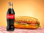 Eating ultra-processed foods like coke and hot dog may lead to higher disease risks and shorter lifespan. Eating ultra-processed foods like coke and hot dog may lead to higher disease risks and shorter lifespan.