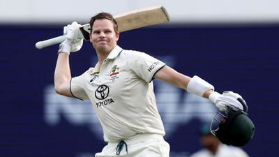 Australia's Steve Smith celebrates reaching his century on Day 2 of the third Test against India in Brisbane. (AFP) Australia's Steve Smith celebrates reaching his century on Day 2 of the third Test against India in Brisbane. (AFP)