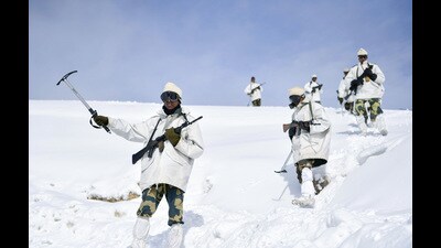 Border Security Force (BSF) personnel patrol in snow-covered areas along the Line of Control (LoC) on Saturday. (ANI) Border Security Force (BSF) personnel patrol in snow-covered areas along the Line of Control (LoC) on Saturday. (ANI)