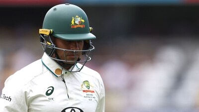 Australia's Usman Khawaja walks off after his dismissal on day two. (AFP) Australia's Usman Khawaja walks off after his dismissal on day two. (AFP)
