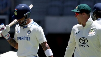 India's Virat Kohli (L) walks past Australia's Steve Smith. (Photo by COLIN MURTY / AFP) (AFP) India's Virat Kohli (L) walks past Australia's Steve Smith. (Photo by COLIN MURTY / AFP) (AFP)