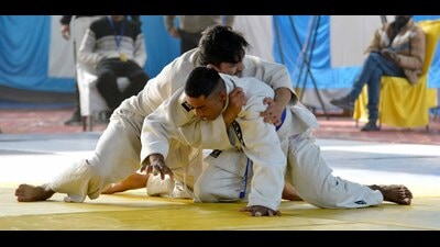 Judo players in action during a match at the National School Games in Ludhiana on Sunday. (Manish/HT) Judo players in action during a match at the National School Games in Ludhiana on Sunday. (Manish/HT)