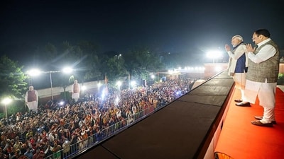 New Prime Minister Narendra Modi and BJP president JP Nadda greet the gathering during the party's victory celebration in the Maharashtra Assembly election, in New Delhi. (ANI)