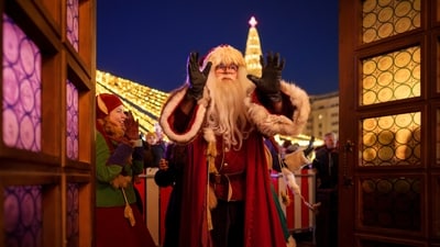 A man wearing a Santa Claus outfit gestures at a Christmas fair in Bucharest, Romania, Saturday. (AP) A man wearing a Santa Claus outfit gestures at a Christmas fair in Bucharest, Romania, Saturday. (AP)