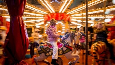 A child rides on a merry go round at Christmas fair in Bucharest, Romania, Saturday. (AP) A child rides on a merry go round at Christmas fair in Bucharest, Romania, Saturday. (AP)
