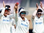 Deepti Sharma and teammates celebrate her five-wicket haul during India's Test match against England Women in Mumbai