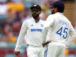 India's Virat Kohli (L) and Rohit Sharma look on during the first day of the third cricket Test match between Australia and India The Gabba in Brisbane India's Virat Kohli (L) and Rohit Sharma look on during the first day of the third cricket Test match between Australia and India The Gabba in Brisbane