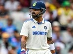 India's Virat Kohli walks back to the pavilion. (Photo by Michael ERREY / AFP) India's Virat Kohli walks back to the pavilion. (Photo by Michael ERREY / AFP)