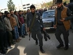 Members of Syria's new authorities walk followed by a car as Syrian soldiers, Members of Syria's new authorities walk followed by a car as Syrian soldiers,