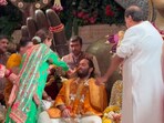 Nita and Anant Ambani share a sweet moment during the haldi function Nita and Anant Ambani share a sweet moment during the haldi function