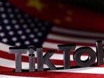 FILE PHOTO: TikTok logo is placed on the U.S. and Chinese flags in this illustration taken, April 25, 2024. REUTERS/Dado Ruvic/Illustration/File Photo