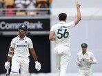Australia's bowler Mitchell Starc (C) celebrates the wicket of India's Yashasvi Jaiswal (L) in the first innings of third Test. Australia's bowler Mitchell Starc (C) celebrates the wicket of India's Yashasvi Jaiswal (L) in the first innings of third Test.