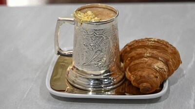 Boho Cafe’s ‘royal menu’ also features other gold-infused delicacies, including Gold Souvenir Coffee (AED 4,761 or INR 1.09 lakh), gold-dusted croissants, drinks, and even ice cream, all served in silverware that customers can take home as keepsakes. Boho Cafe’s ‘royal menu’ also features other gold-infused delicacies, including Gold Souvenir Coffee (AED 4,761 or INR 1.09 lakh), gold-dusted croissants, drinks, and even ice cream, all served in silverware that customers can take home as keepsakes.
