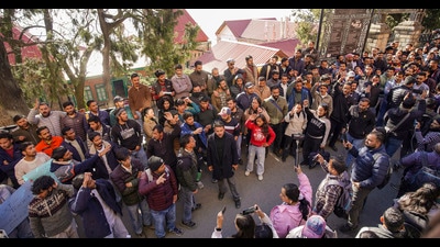 Berojgar Sangh members stage a protest against the guest teacher policy in Shimla on Monday. (PTI)